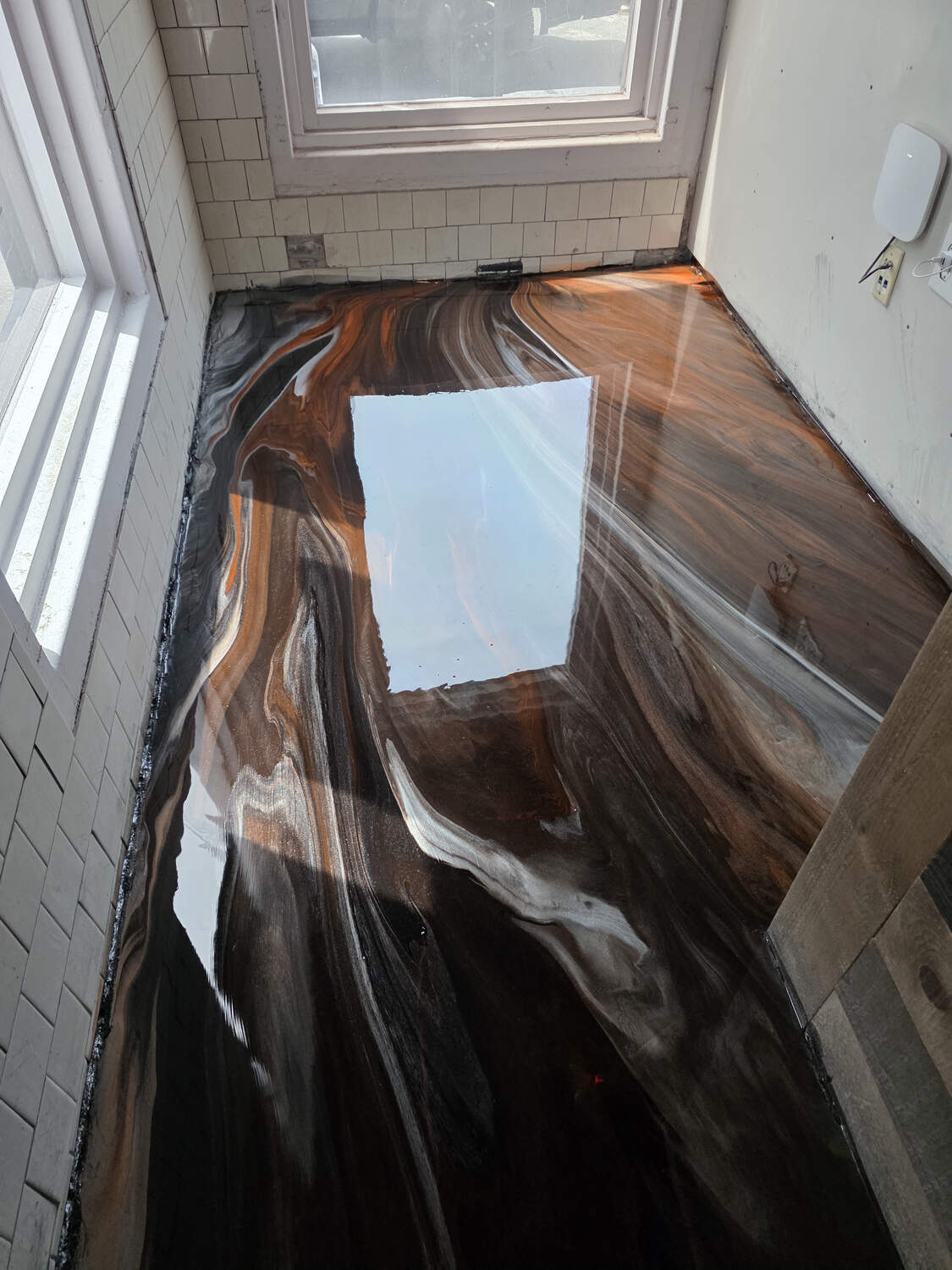 Copper metallic epoxy entryway floor